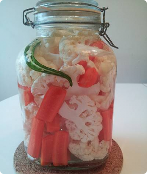 Fermenting Cauliflower and Carrots cauliflower and carrots fermenting in mason jar